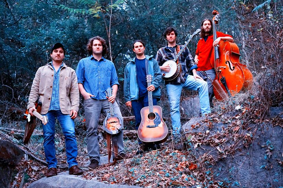 A photo of five individuals holding instruments. Up and coming Richmond neo-bluegrass band, South Hill Banks.