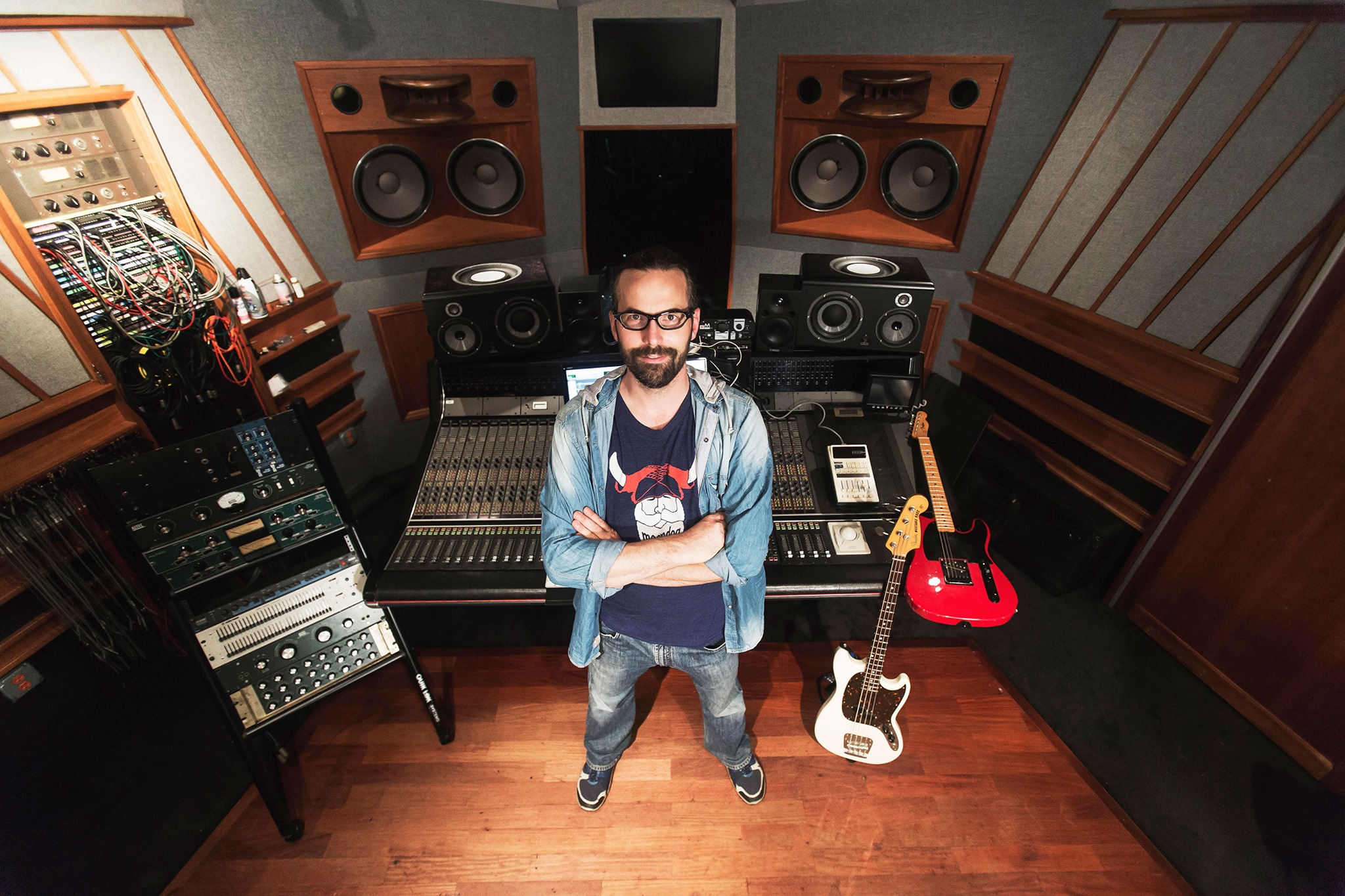 Audio Engineer Marc Urselli standing within a recording studio
