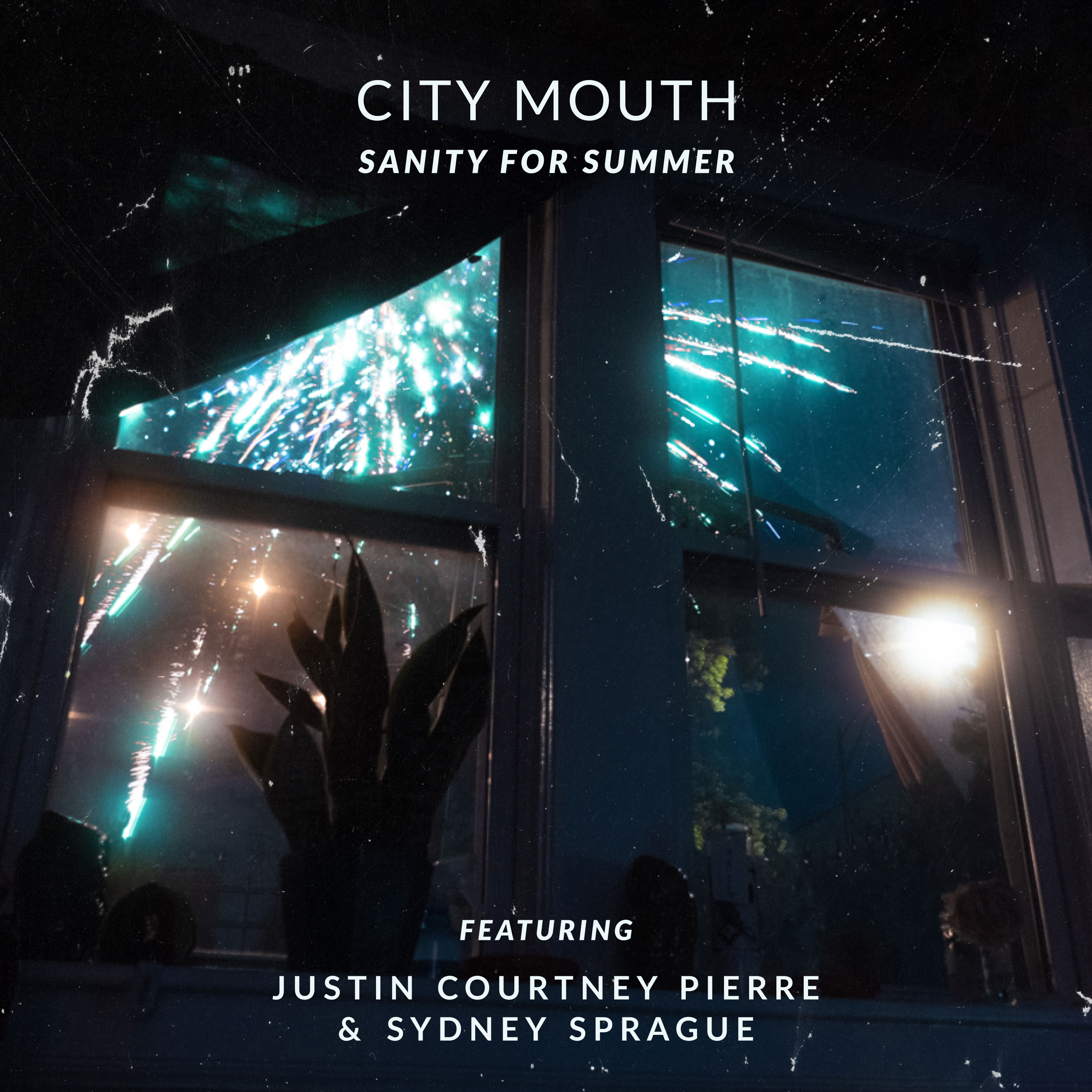 View of colored fireworks from the inside of a house window at night. Plants sit on the windowsill inside. Text in the image frame reads, "City Mouth, Sanity for Summer; Featuring Justin Courtney Pierre; Sydney Sprague